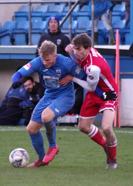 Tom Dyson works hard to keep possession Tom Dyson works hard to keep possession
